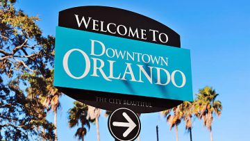 Orlando downtown welcome sign with tropical scene